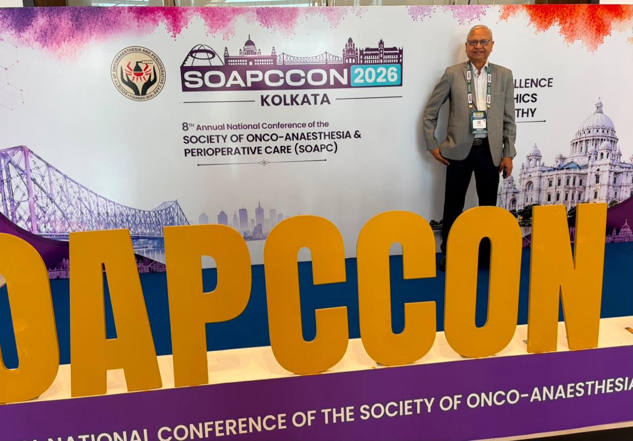 Dr. Jain at SOAPCCON 2026 Backdrop